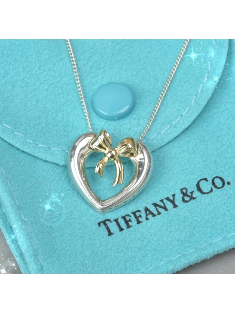 Tiffany & Co 18K Heart with Bow Necklace Silver